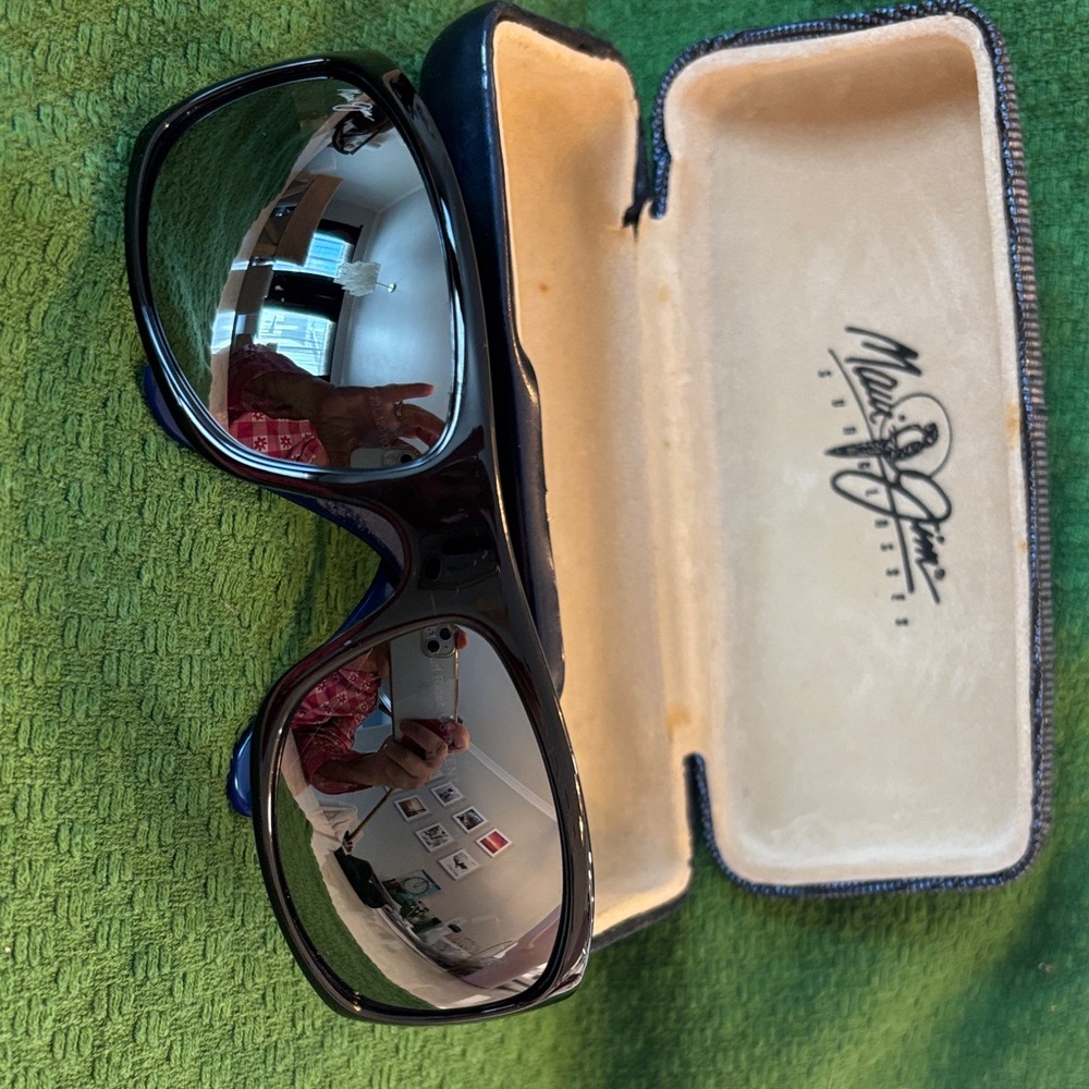 Maui Jim Glossy Black Sunglasses with a blue frame inside